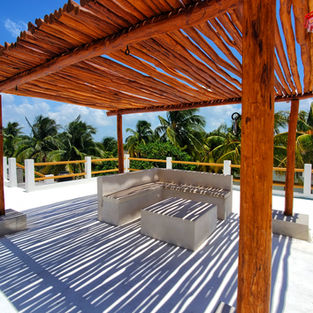 Rooftop pergola is perfect for relaxing in the shade and enjoying beach breezes.