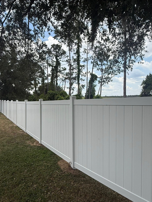 White Tongue and Groove Privacy PVC Fence.