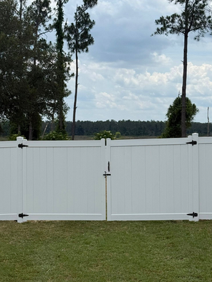 White Tongue and Groove Privacy PVC Fence.