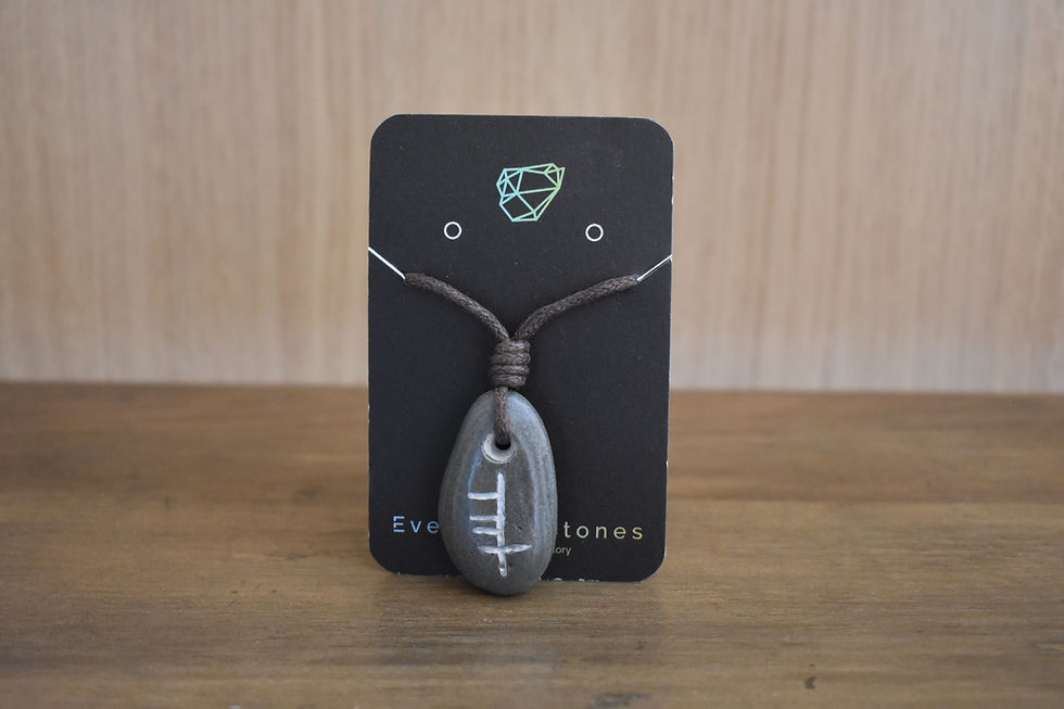 Ádh Luck Pendant with Ogham inscription on grey stone