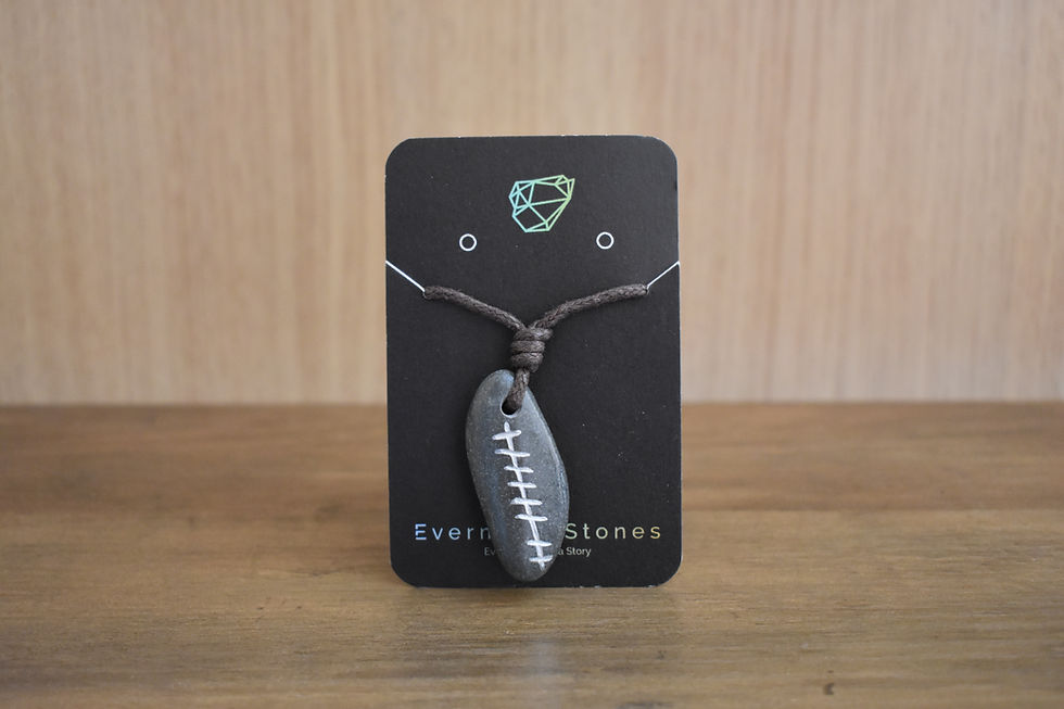 Grá Love Pendant on a black display card