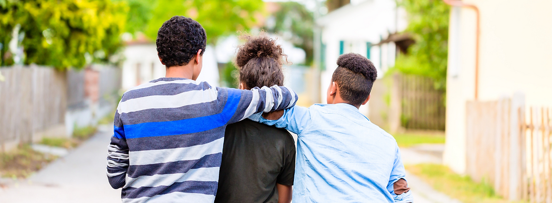 Teenagers linking arms and feeling happy because they attended youth therapy sessions at Burgess Counselling in London Ont.