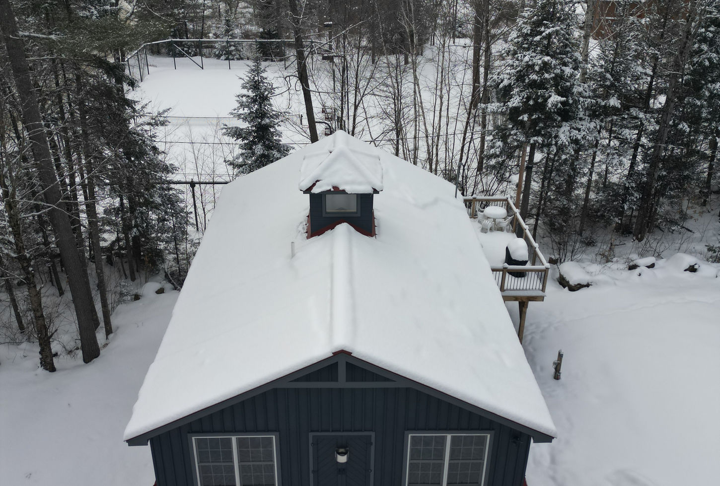 Aerial view of home in winter