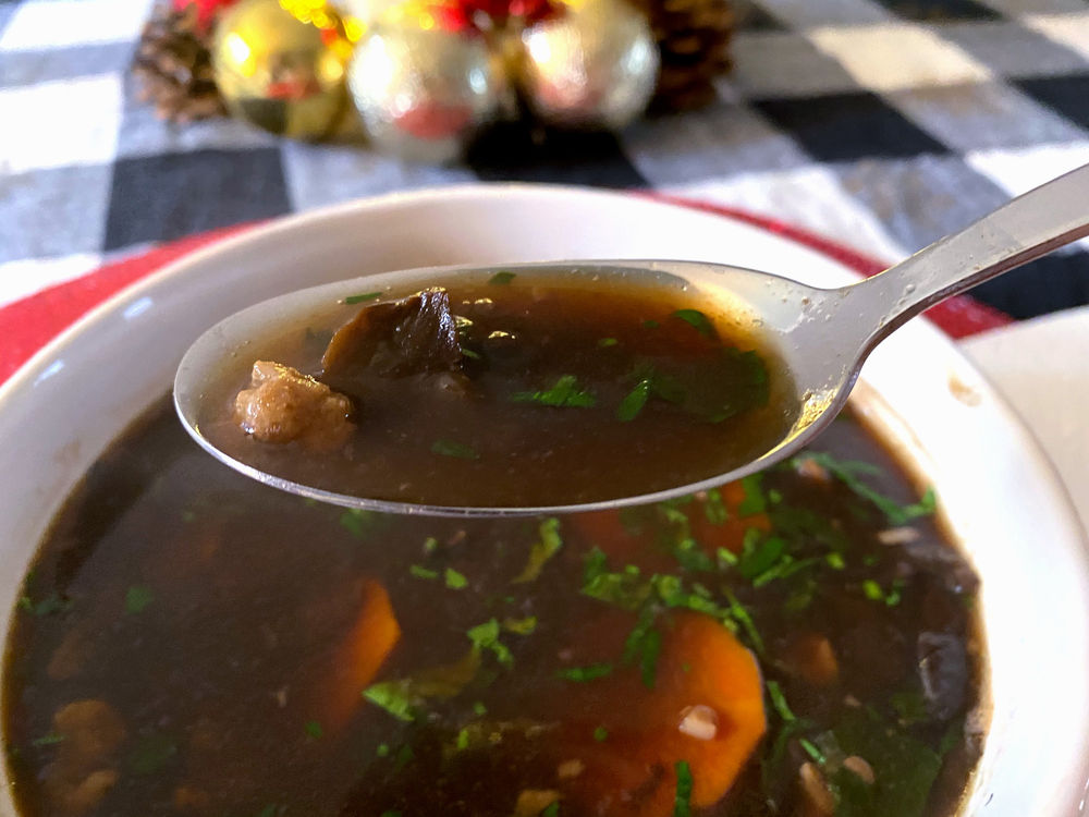 Polish Christmas Dried Mushroom Soup with no cream and poured noddles