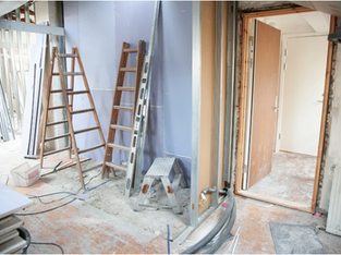 Messy, dusty room after the builders have been doing some work in a resjdential property