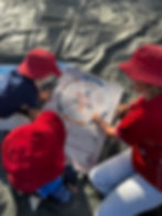 Nature Explorer children looking at Aboriginal calendar seasons
