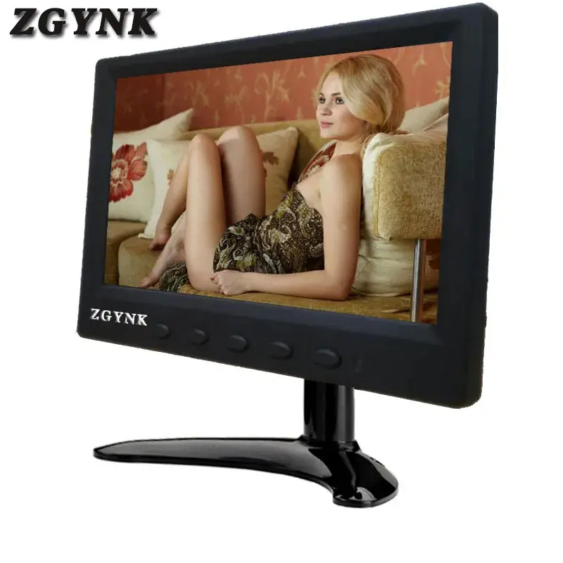 Small black ZGYNK monitor showing a woman