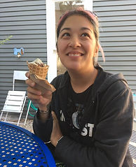 Angela eating outside Furniture City Ice Cream.