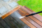 deck being cleaned with a pressure washer in charlotte