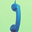 Blue telephone handset hanging on light green background. Space for text