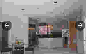You can see the cooktop is located in the island - which client dislikes.