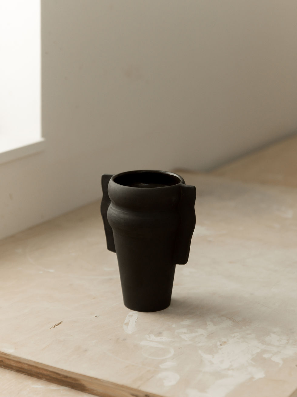 Black stoneware ceramic vase handmade by Eli West