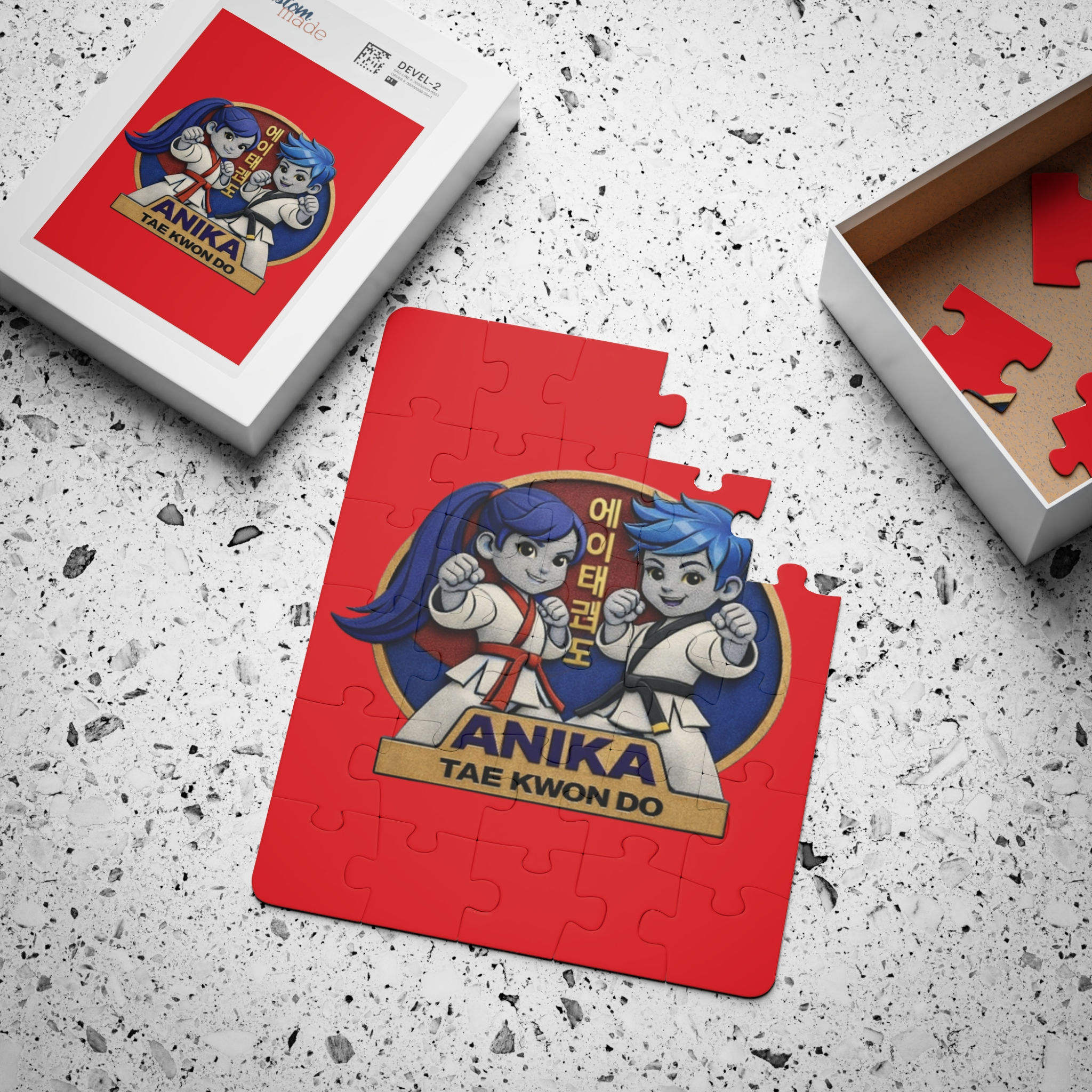 Red Anika Tae Kwon Do puzzle with cartoon martial artists