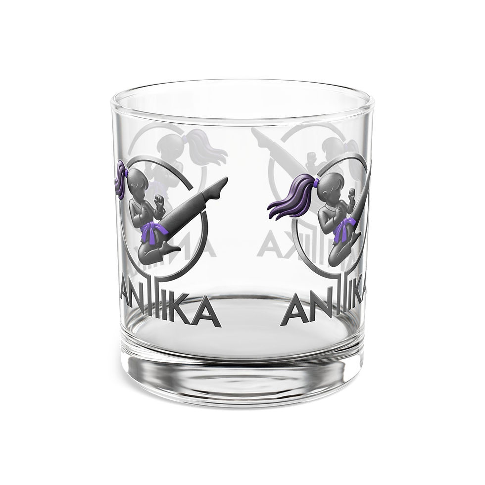 Glass with Anika logo and martial arts figures