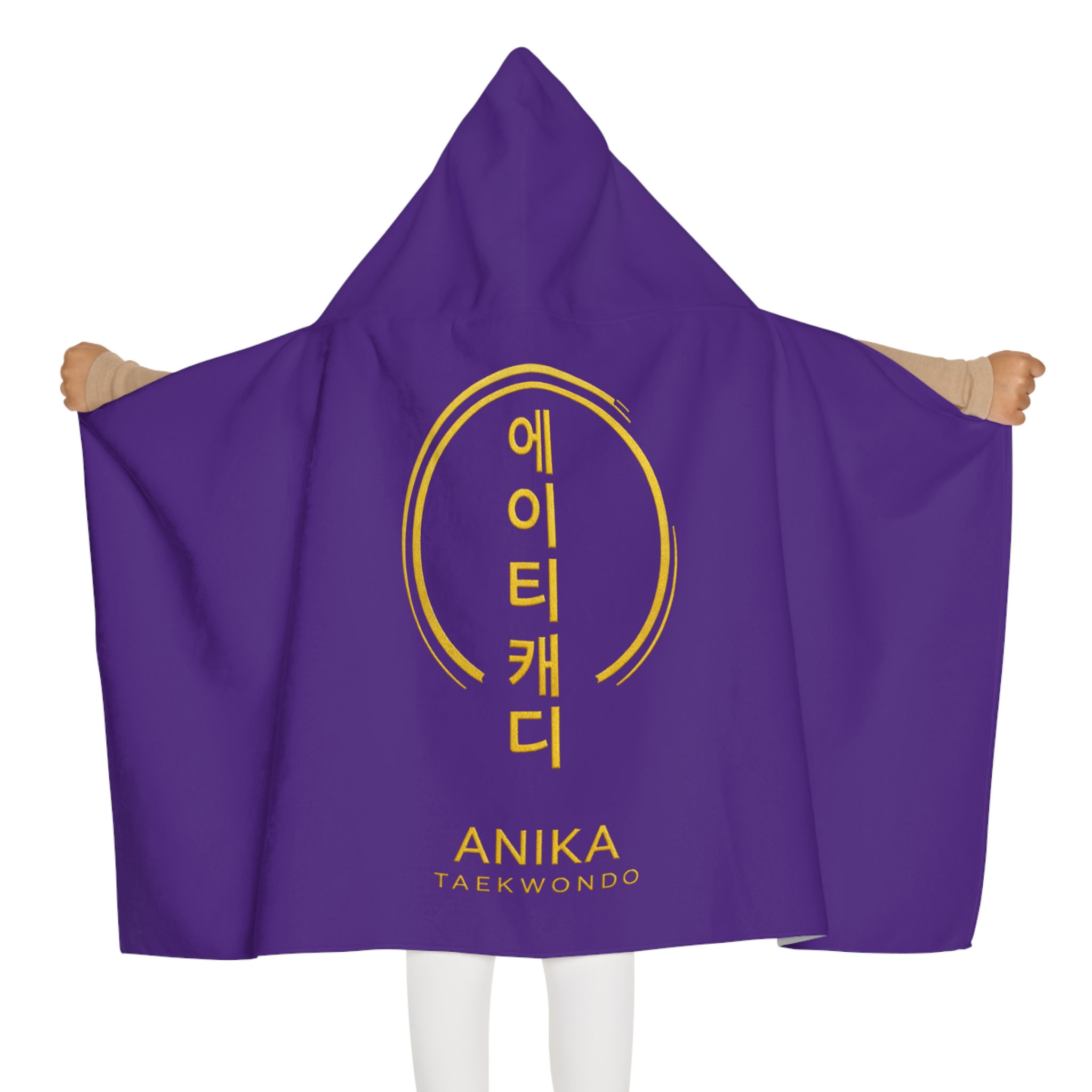 Purple hooded blanket with ANIKA TAEKWONDO gold emblem