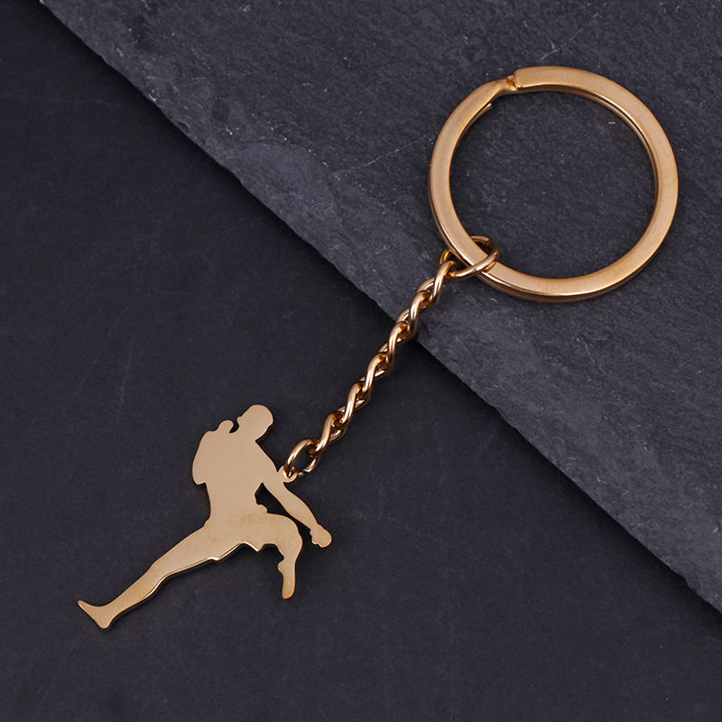 Thumbnail: Golden keychain with athlete silhouette in throwing pose