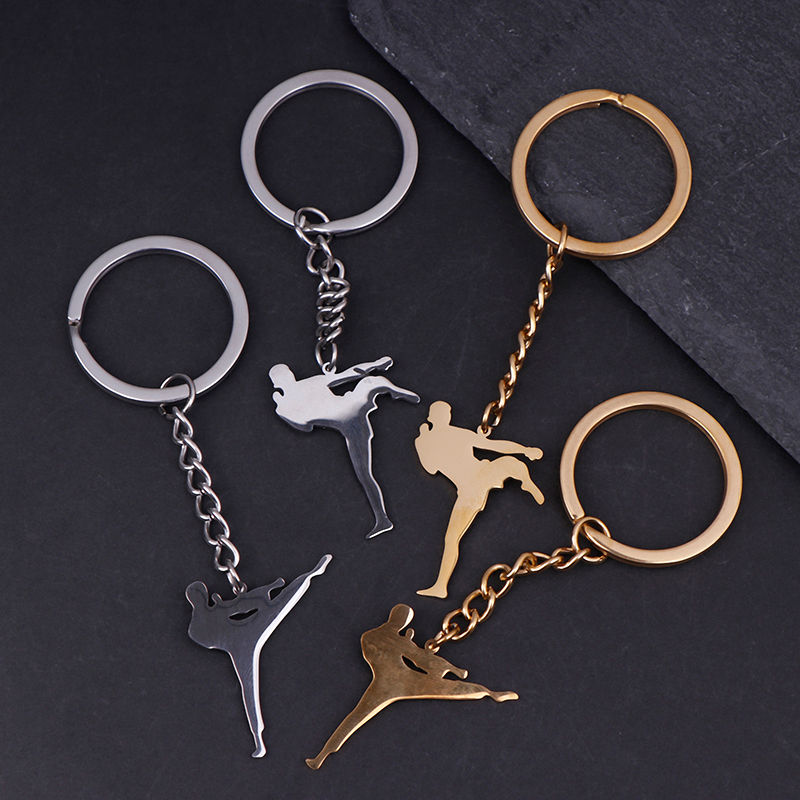 Miniature : Silver and gold keychains with martial arts figures