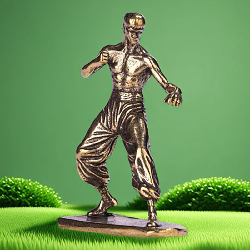 Bronze martial artist figurine in fighting stance