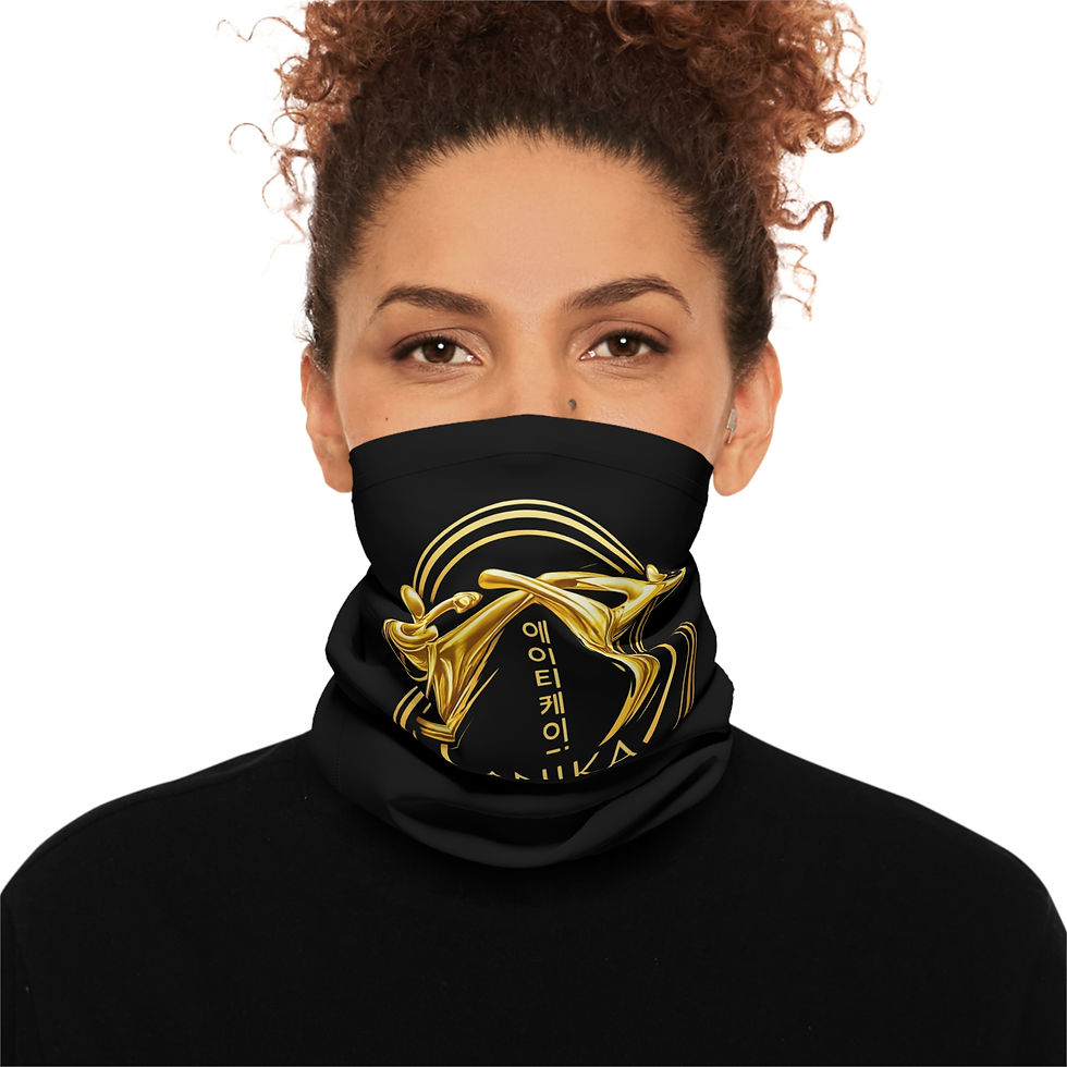 Thumbnail: Person wearing black neck gaiter with gold taekwondo design