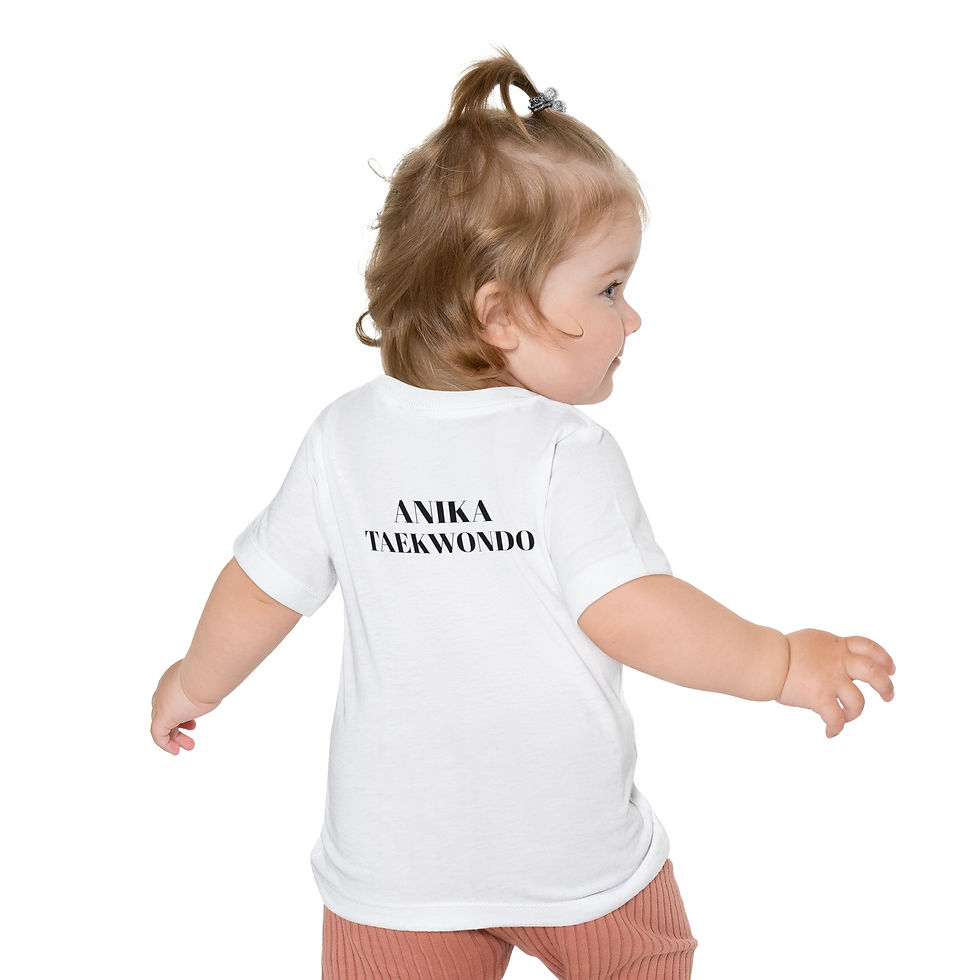 Miniature : Child in white t-shirt with ANIKA TAEKWONDO text