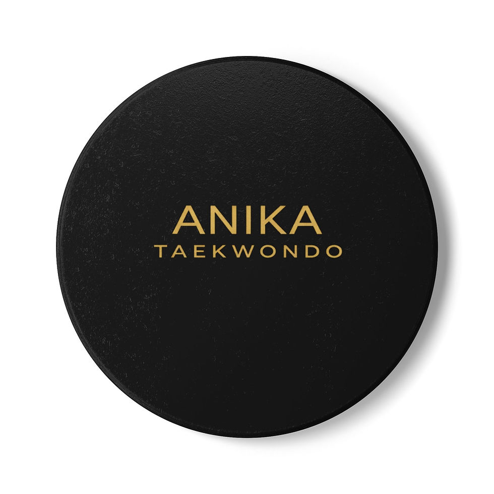Miniature : Black disk with Anika Taekwondo in gold text
