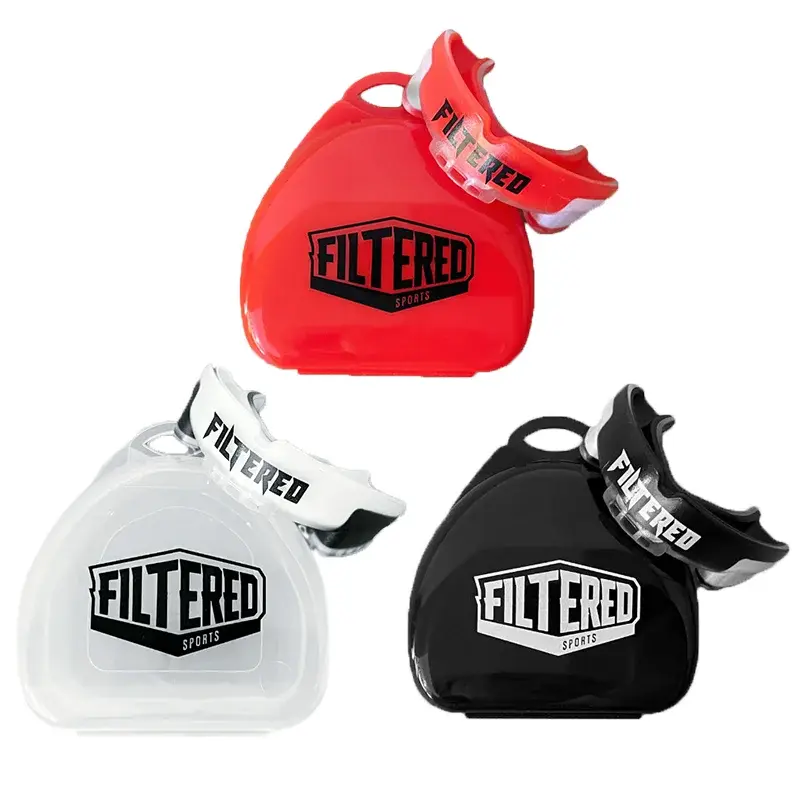 Thumbnail: Red, white, and black FILTERED mouthguards in cases