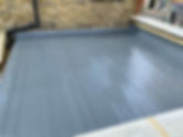 A brand new grey flat roof