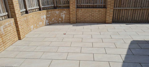 Newly laid patio within a garden