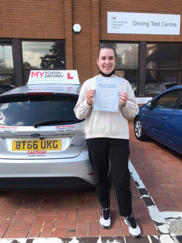 Female student passing his driving test