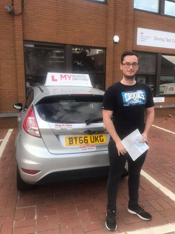 Student passing his driving test