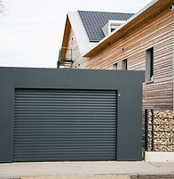 Modern roller garage door in black