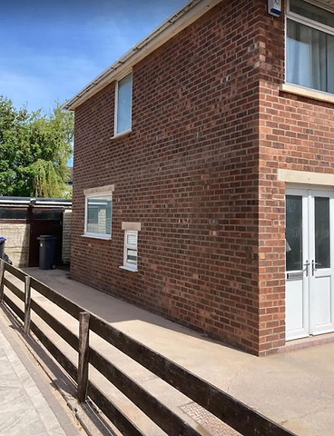 pointing work on side of house