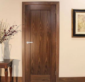 Dark wood panelled door