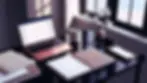 Desk with laptop ad digital resources
