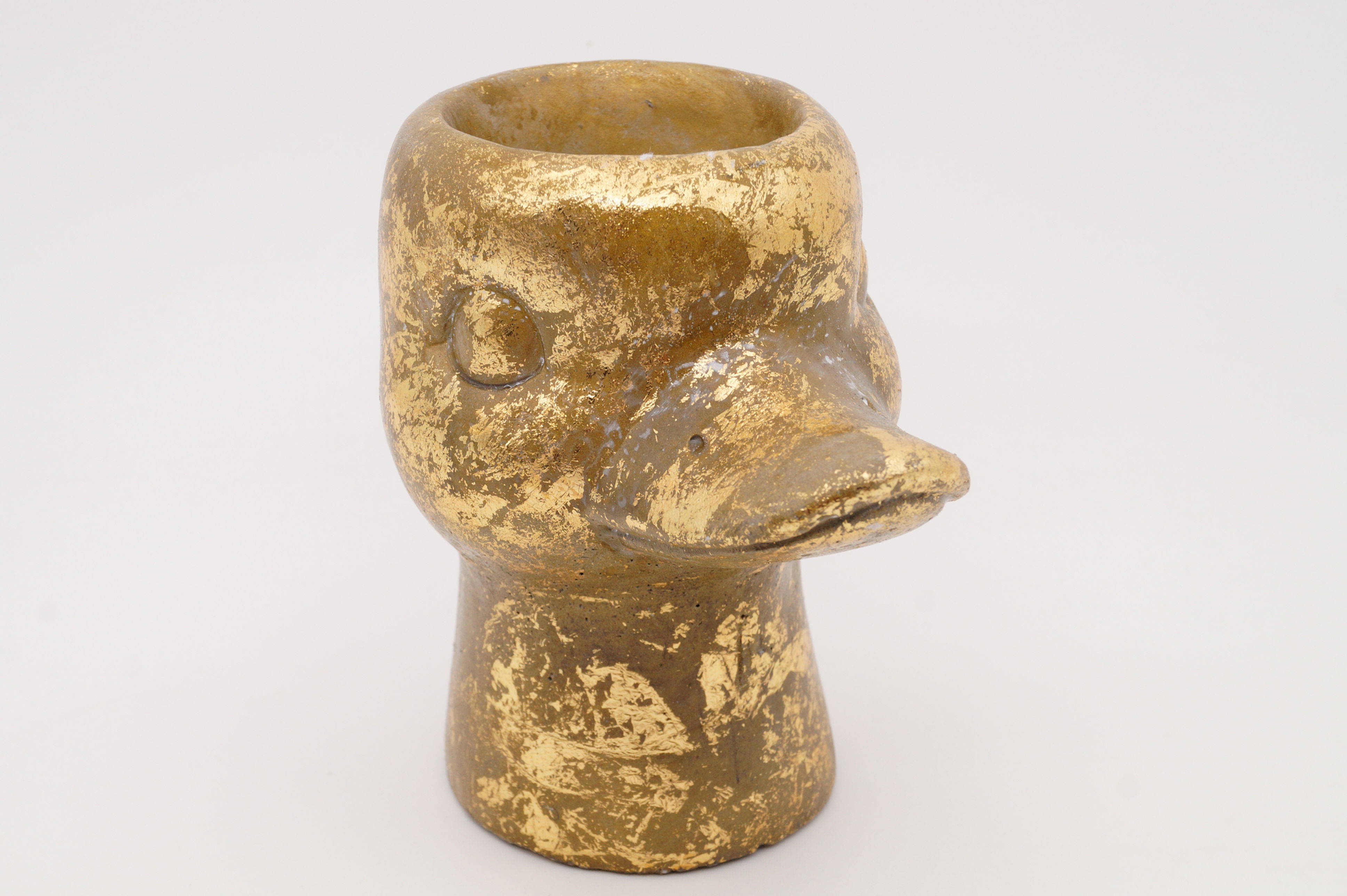 Goldene Ente – entzückender Blumentopf