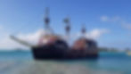 Pirate ship replica on turquoise waters