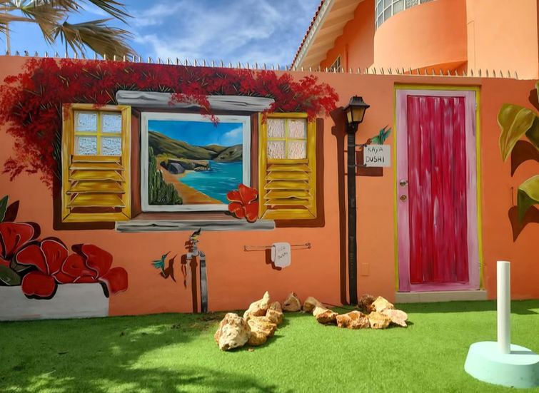 Customized mural of a window to the beach to make the garden bigger