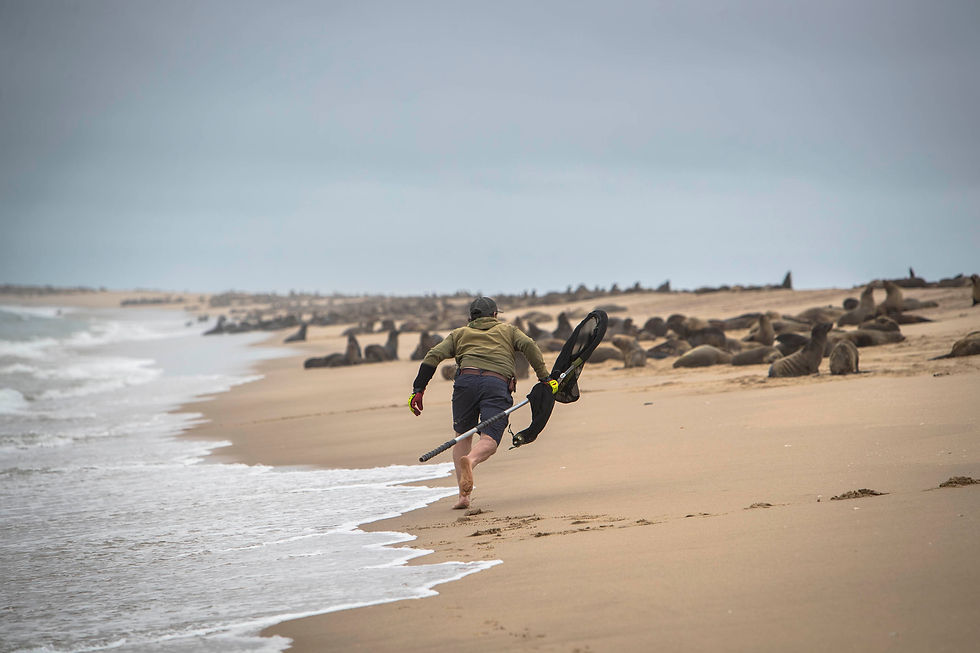 Naude Dreyer Ocean Conservation Namibia on seal rescue patrol at Pelican Point