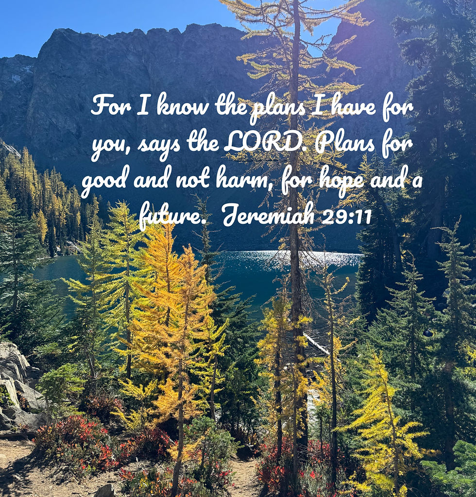 Blue Lake with golden larches and mountain peaks and scripture reference of Jeremiah 29:11.