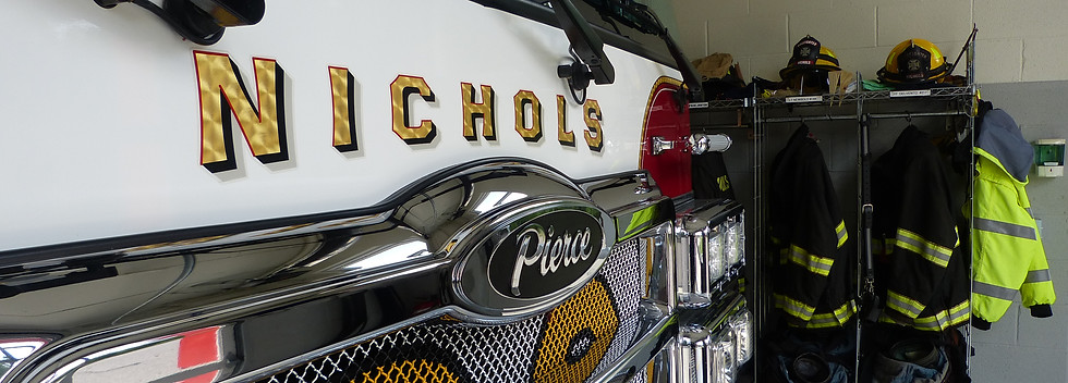 close up of the front of a firetruck at Nichols Fire Department