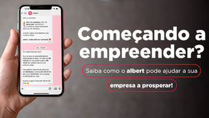 Mão segura celular com conversa do Albert; ao fundo, texto promocional: Começando a empreender? em fundo cinza.