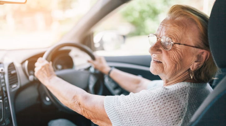 Elderly driver having passed driving licence eye testing in Sydney
