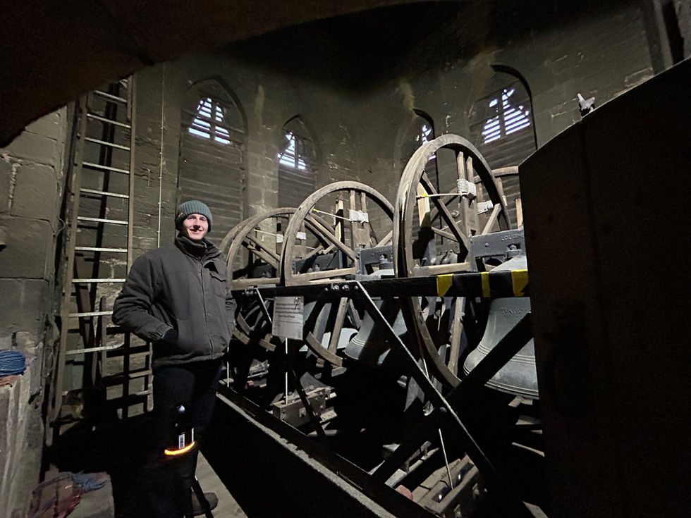 Survey access within the bell tower at St Mary’s Church, Whaplode, beside the historic bell frame and bells