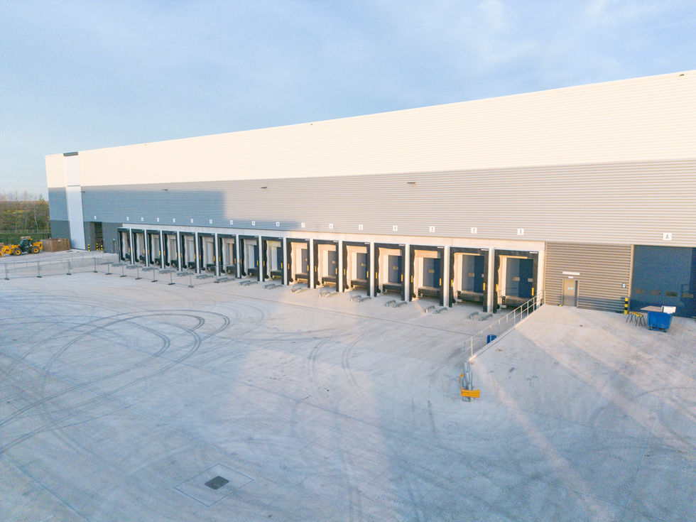 External view of warehouse loading dock bays and service yard