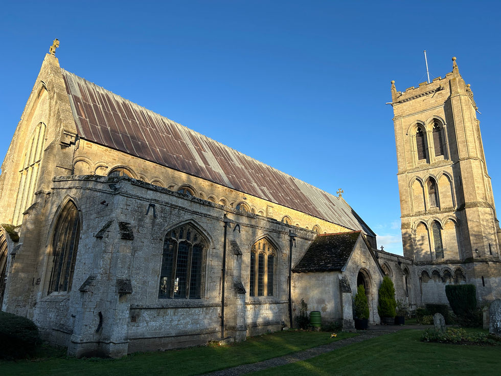 External photograph of St Mary’s Church, Whaplode, capturing the historic parish church, prominent tower, aisle and nave roof. The image supports the project’s focus on survey work, roofing repairs and upgrades to a significant historic building.