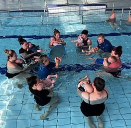 Group of mums and babies in the swimming pool