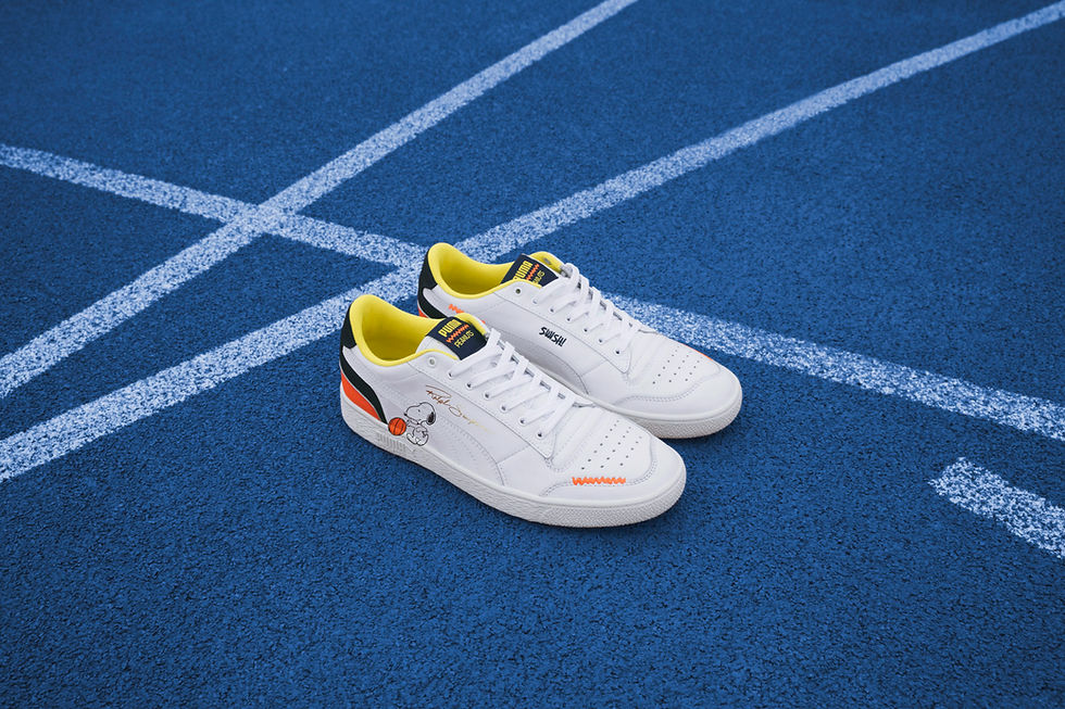 White sneakers on a blue pavement
