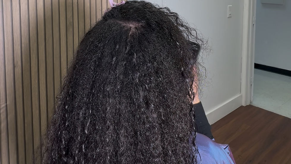 Close-up view of Houston K-Tip hair extensions installed