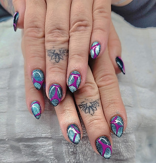 blue an pink groovy nail art after a manicure
