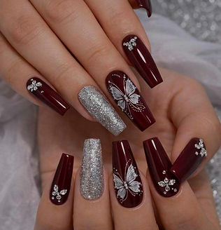 red and silver acrylic nails with nail art and gel coating